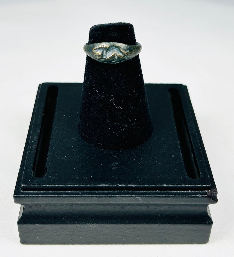 Authentic Roman Empire bronze ring featuring rodent design in relief with aged surface wear