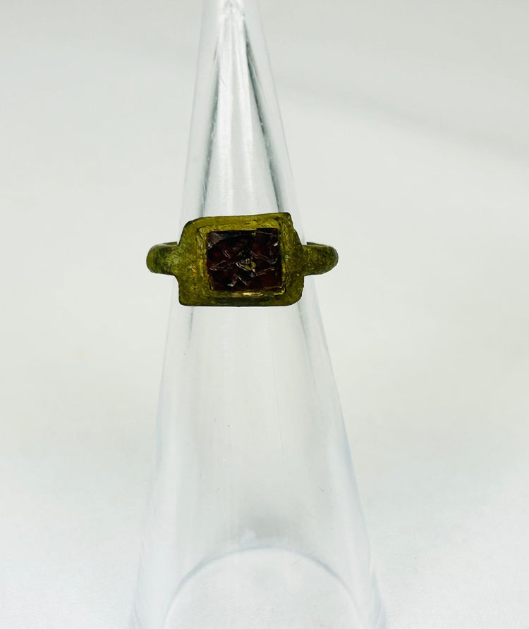 Ancient Roman bronze finger ring with symbolic carved intaglio and aged patina
