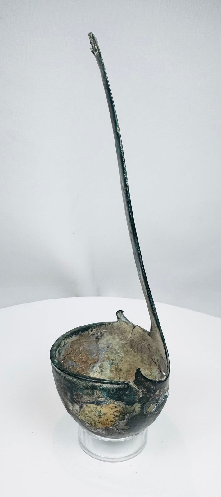 Ancient Roman ritual or serving ladle with hemispherical bowl and flat handle