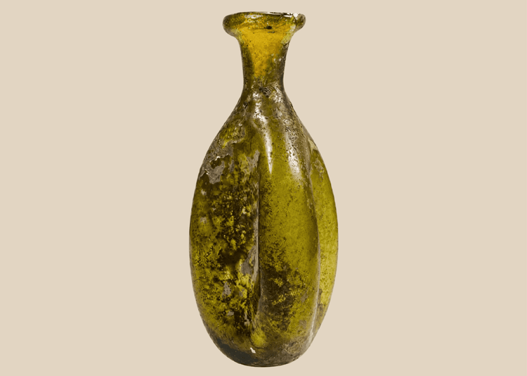 Ancient Roman free-blown olive green glass flask with vertical fluting, circa 1st–3rd Century AD
