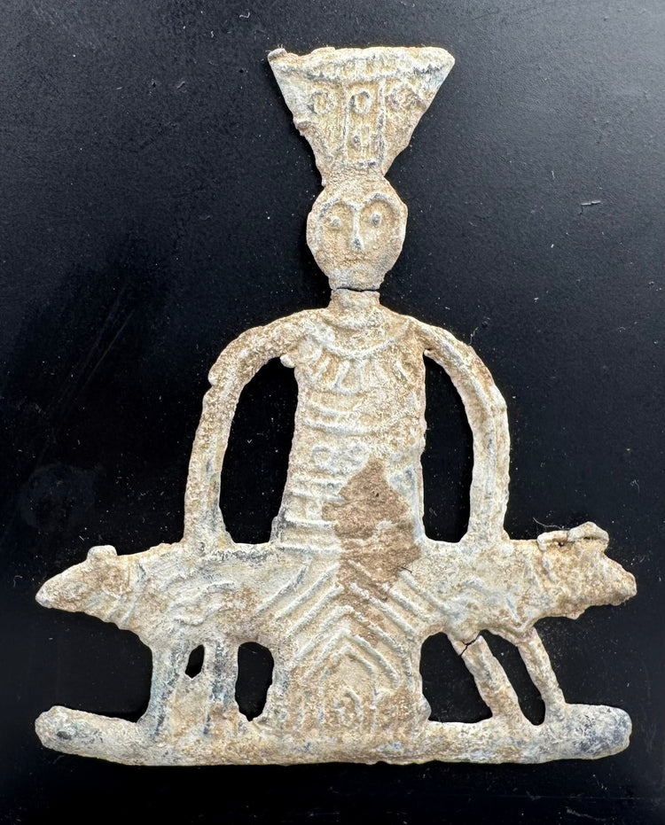 Roman Heliopolis votive figure mounted on a black wooden display stand