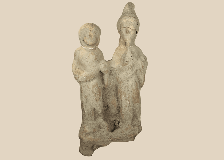 Ancient Greek terracotta votive figural group from Taormina, Sicily, depicting two standing human figures.