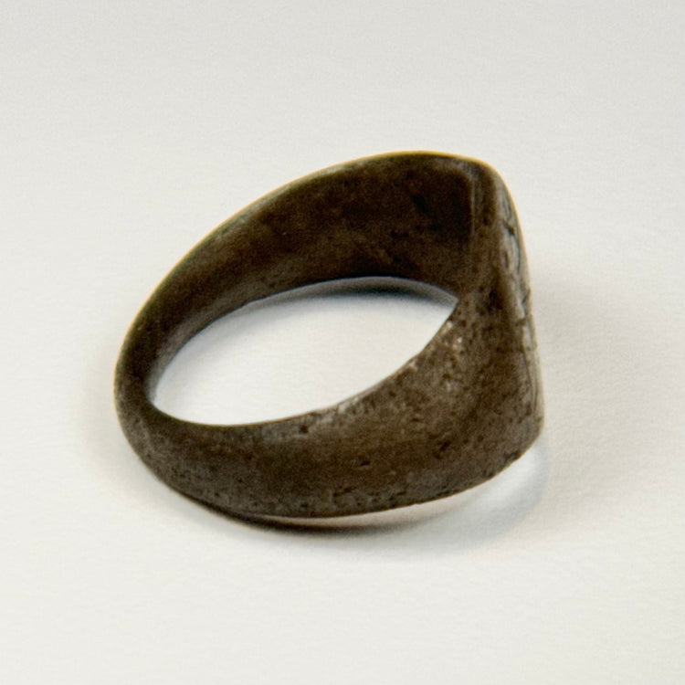 Early Byzantine silver ring featuring a finely engraved sunburst design on the bezel
