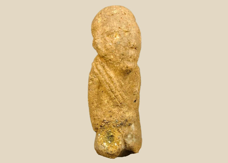 Ancient Sokoto terracotta figurine, West Africa, circa 500–200 CE, hand-modeled clay figure with stylized features and weathered patina, mounted on a display stand.