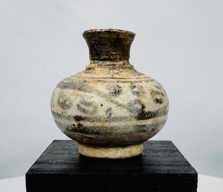 Collection of four miniature Sukhothai Period stoneware jars and containers showcasing traditional Sawankhalok kiln craftsmanship.