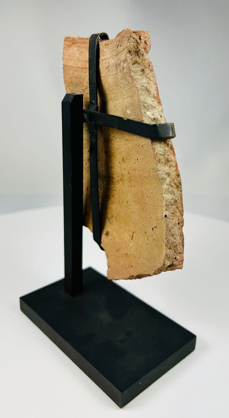 Fragment of ancient theatrical mask made of terracotta from the Mediterranean world circa 2nd century BCE–2nd century CE.
