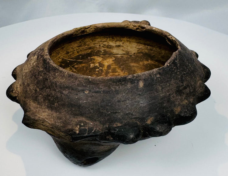Interior view of an authentic Pre-Columbian tripod vessel showing the deep bowl and naturally aged ceramic surface.