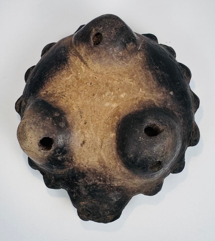 Ancient Mesoamerican tripod bowl with archaeological wear, mineral deposits, and rich firing variations from West Mexico.