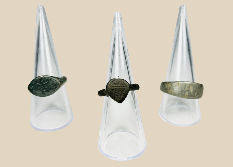 Set of three ancient European bronze finger rings with aged patina