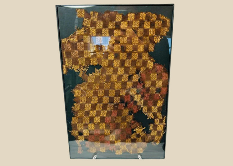 Chancay textile fragment from coastal Peru, circa 1000–1470 CE, finely woven cotton with vibrant checkerboard motif in natural dyes.