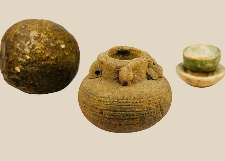 Dense, smooth, near-spherical stone with natural patina and weathering marks, possibly used as a grinding implement, pestle, or projectile, Southeast Asia or Indian Subcontinent, diameter 3 in, age unknown (possibly several centuries to over 1,000 years).