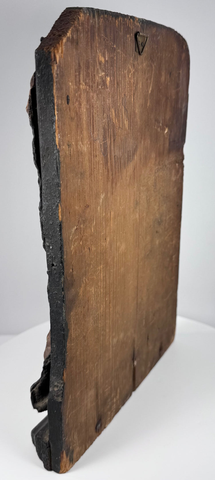 Reverse construction of Baroque devotional panel showing aged wood, historic nails, repairs and structural cracks