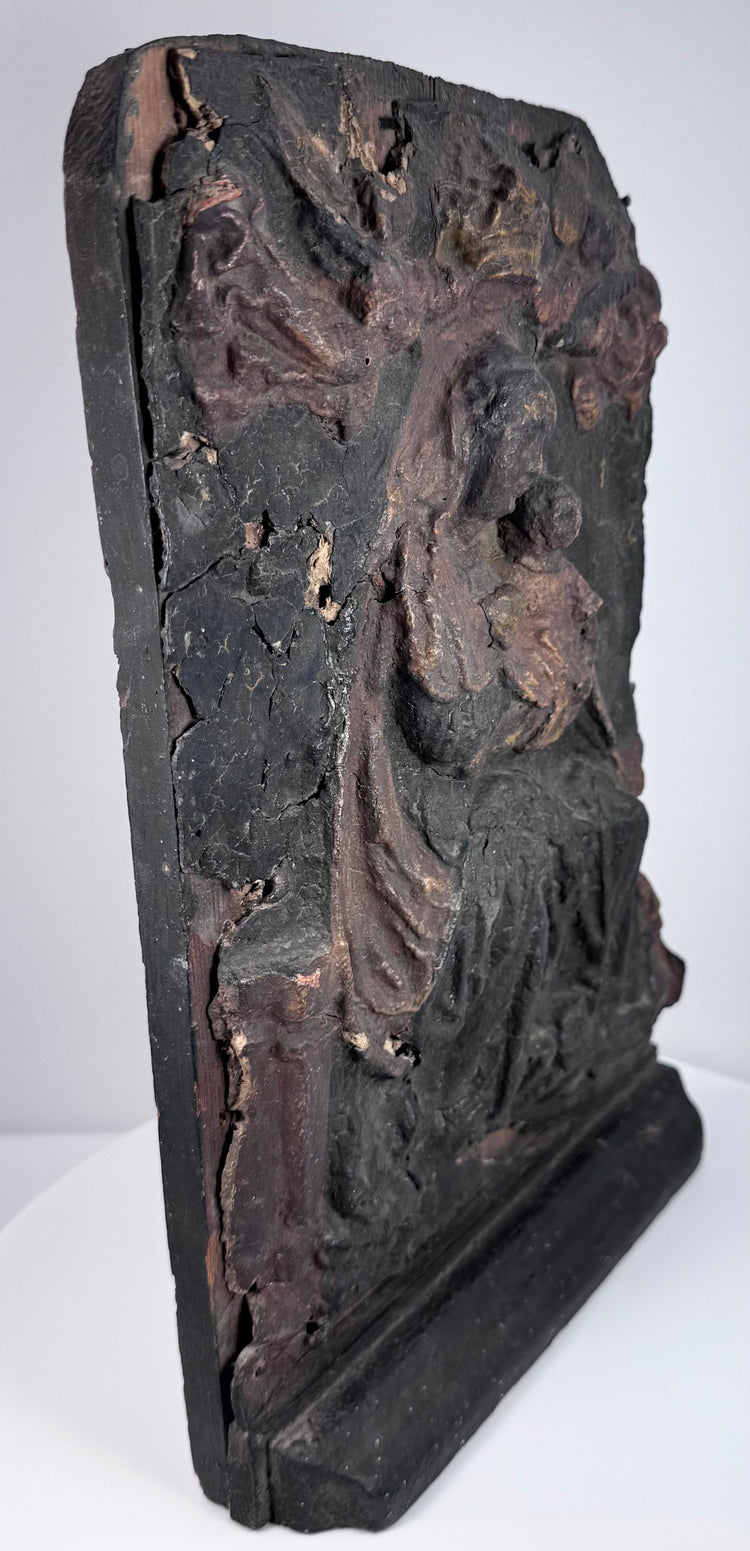 Plain wooden reverse of antique Virgin and Child relief showing vertical grain, tool marks and later hanging hardware