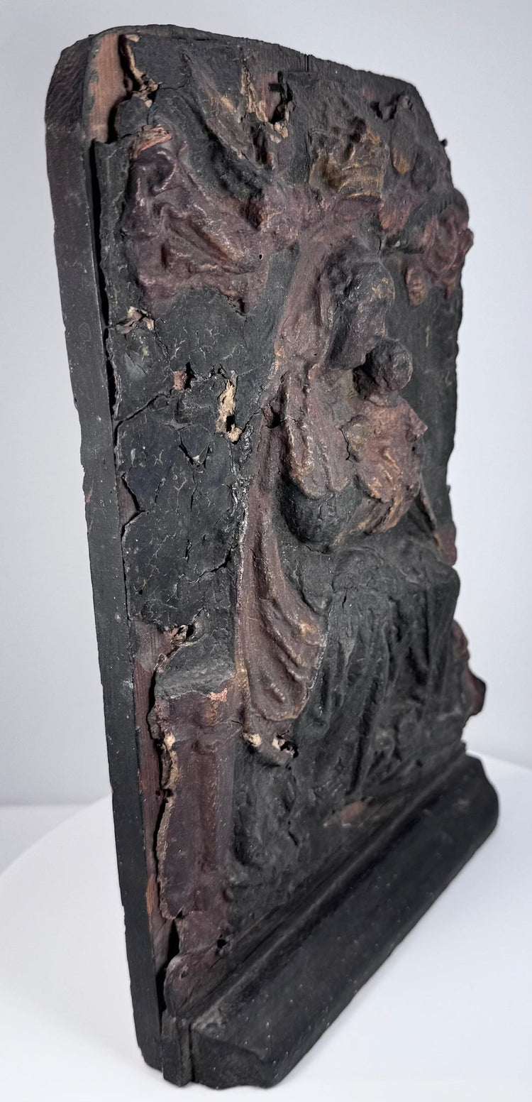 Plain wooden reverse of antique Virgin and Child relief showing vertical grain, tool marks and later hanging hardware