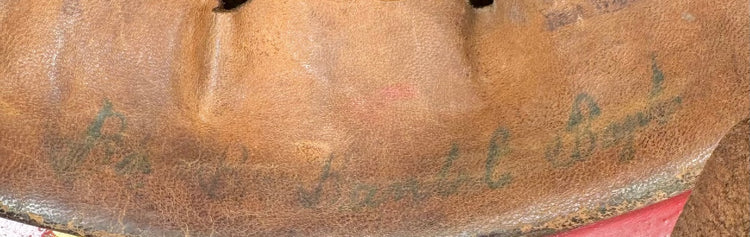 Close-up of aged leather liner and faded period markings inside German Feuerwehrhelm, circa 1908–1934