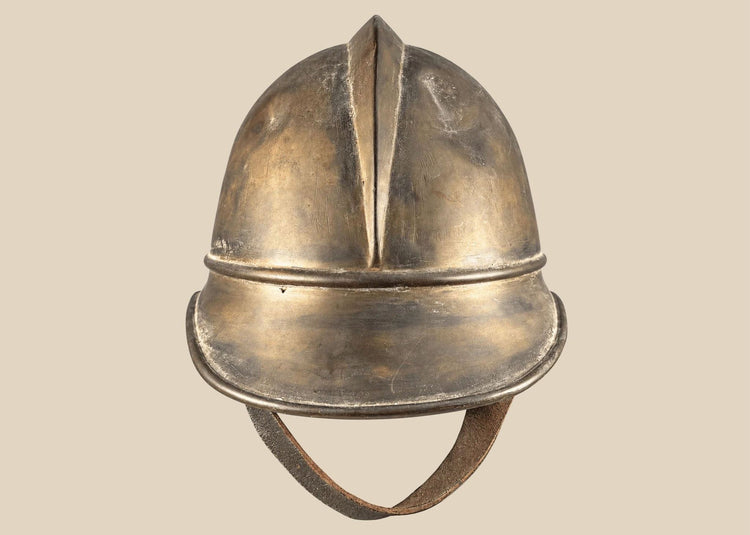 Antique Bavarian German brass firefighter helmet with leather chinstrap, circa 1908–1934
