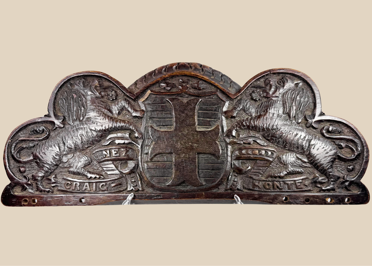 Antique Bentinck family heraldic oak pediment with cross moline, paired lions, and Craignez Honte motto