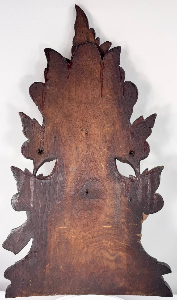 Antique Swiss or southern German woodcarving with pineapple-like central fruit, pomegranate forms and carved basket latticework