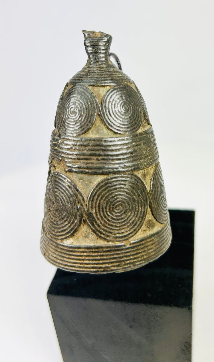Tibetan ritual ghanta bell displaying detailed casting and traditional Buddhist symbolism.