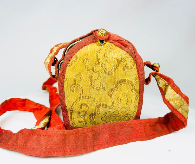Museum-style display of an 18th–19th century Tibetan Buddhist Gau amulet shrine