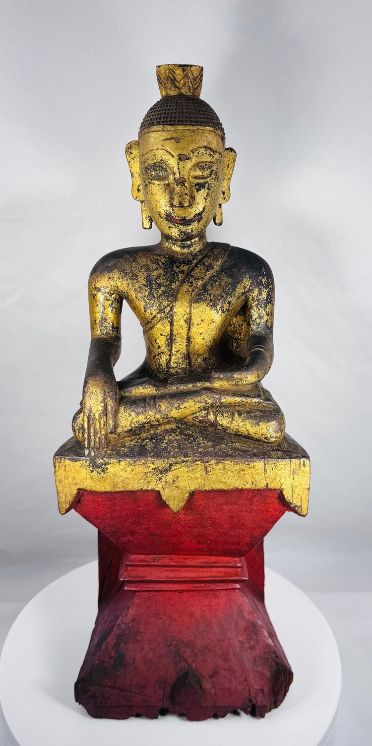 Burmese Shan-style Buddha figure displaying the Earth Witness gesture and aged patina.