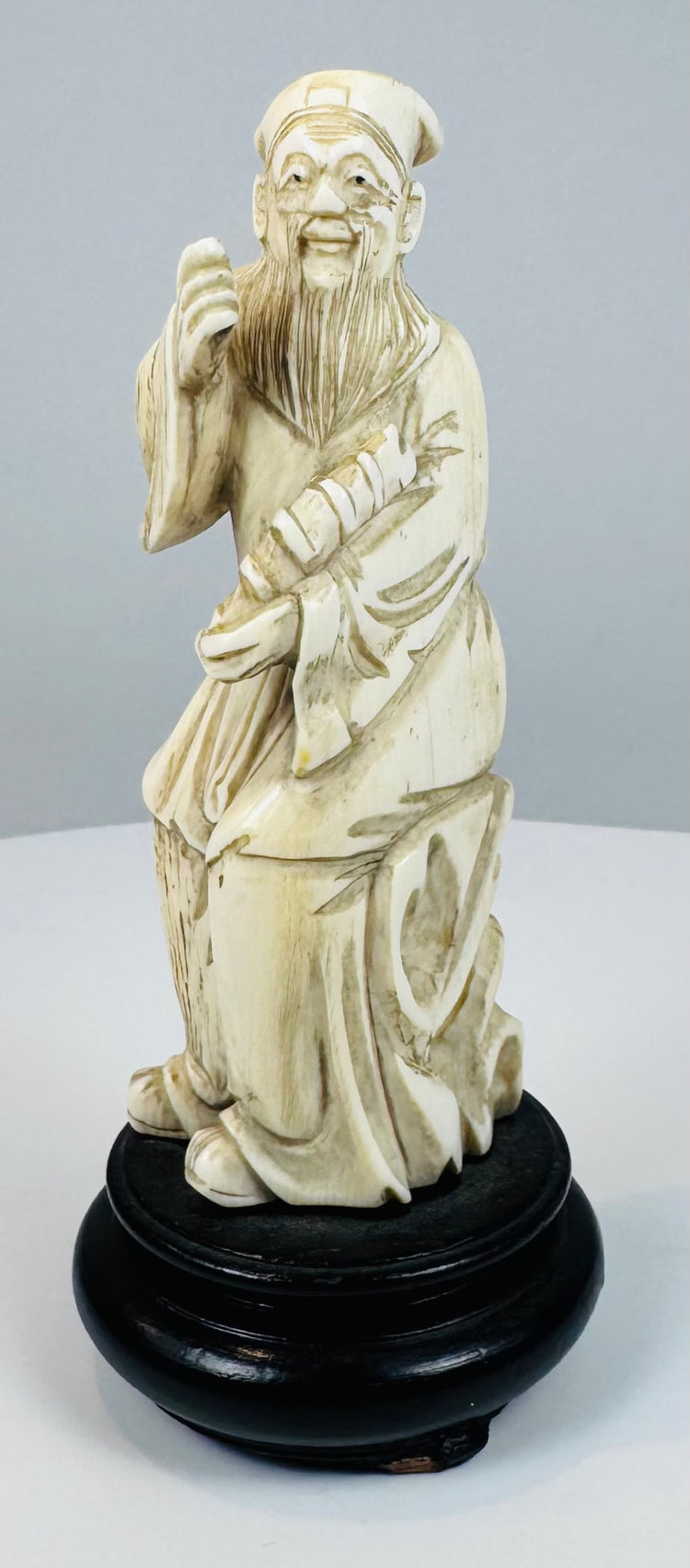 Chinese Zhang Guolao sculpture with incised beard and stained robe details