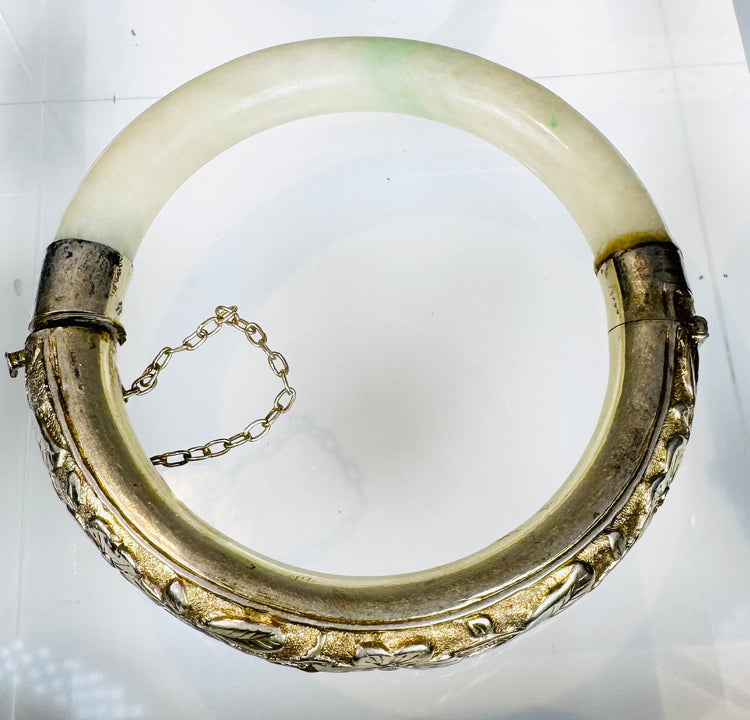Early 20th-century Chinese silver-mounted hardstone bracelet with floral decoration