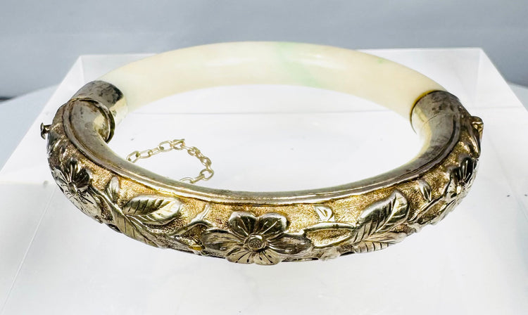 Chinese silver and jade bracelet with floral relief decoration and hinged clasp