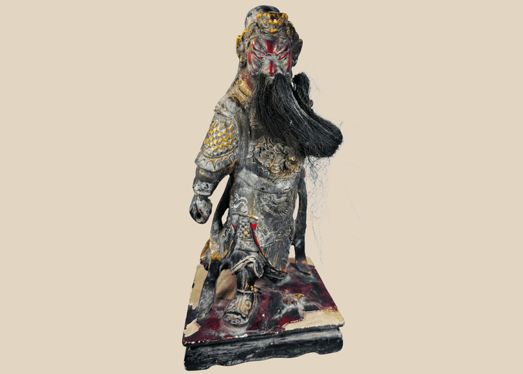 Antique Chinese carved wood statue of Guan Yu with red face and long black beard
Chinese polychrome lacquer temple figure of Guan Gong in ceremonial armour
