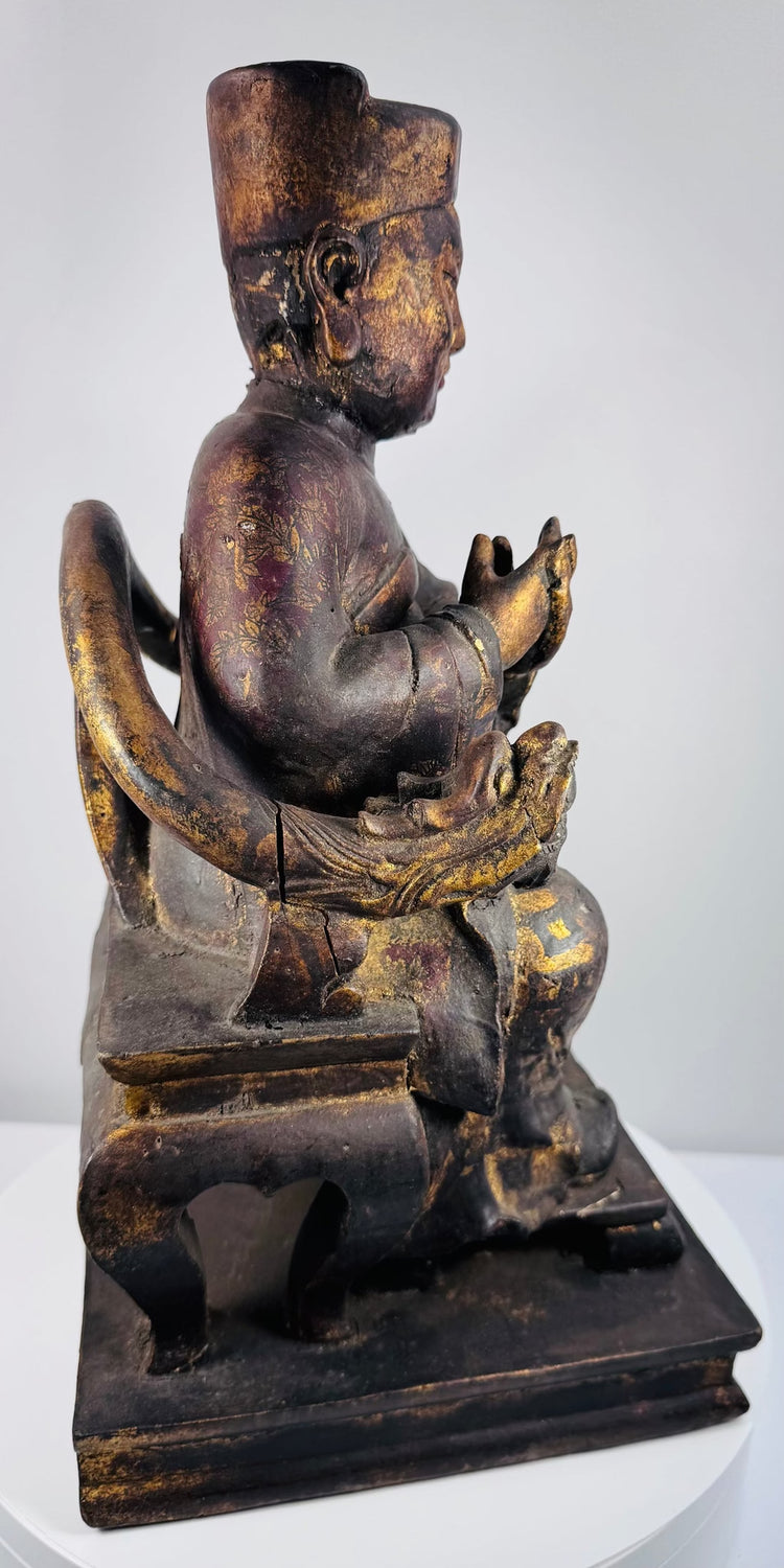 Rear view of antique Chinese Qing Dynasty wooden ancestor figure showing carved throne construction and aged surface