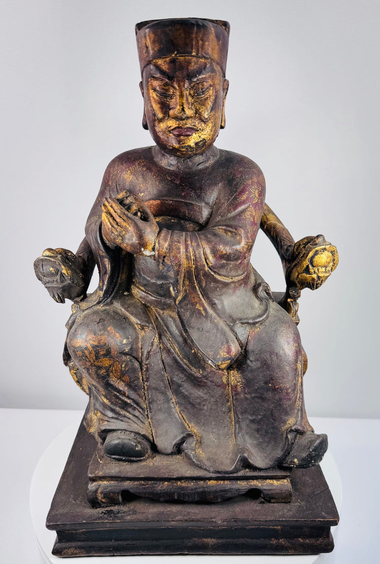 Front view of 19th-century Chinese carved wood civil official figure wearing formal robes and a tall square court cap
