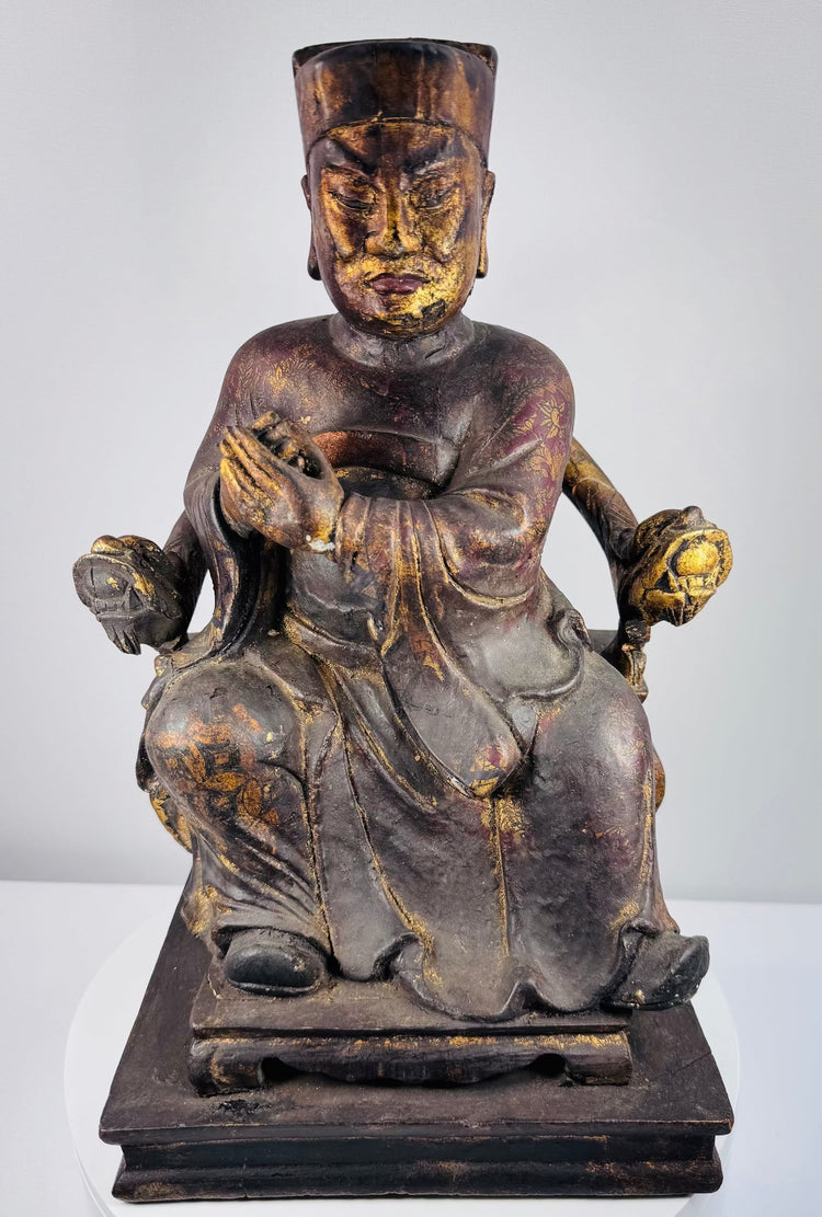 Front view of 19th-century Chinese carved wood civil official figure wearing formal robes and a tall square court cap