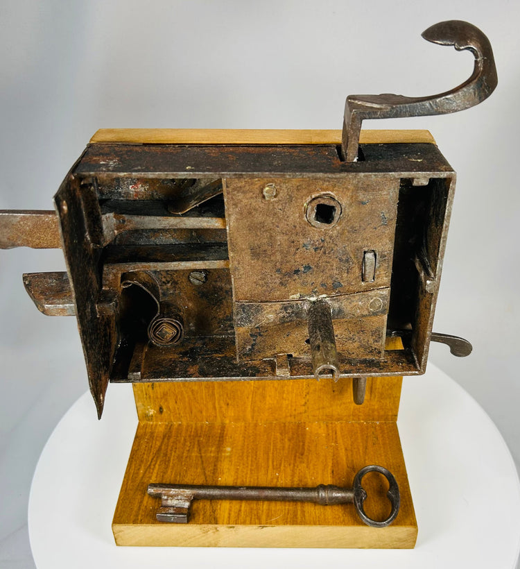 Industrial era hand-forged lock with visible internal engineering details