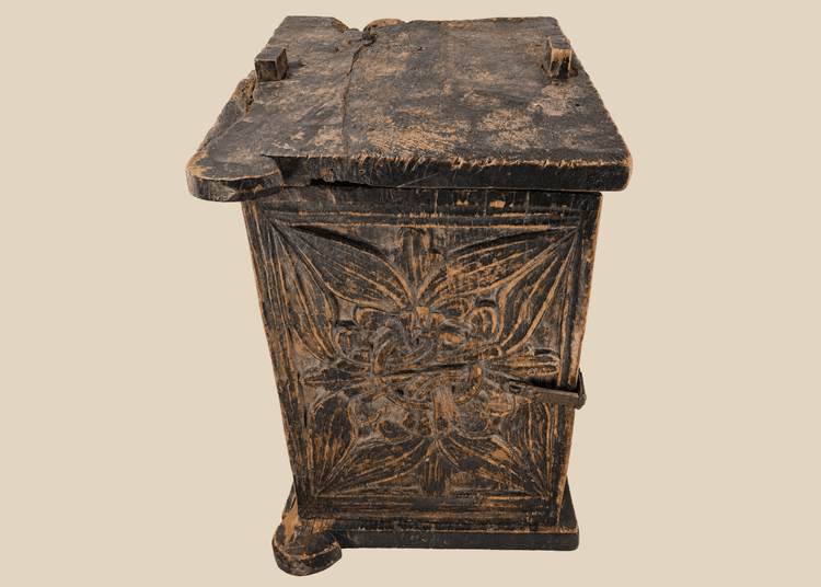 Antique South Asian carved wooden chest with floral panel and iron latc