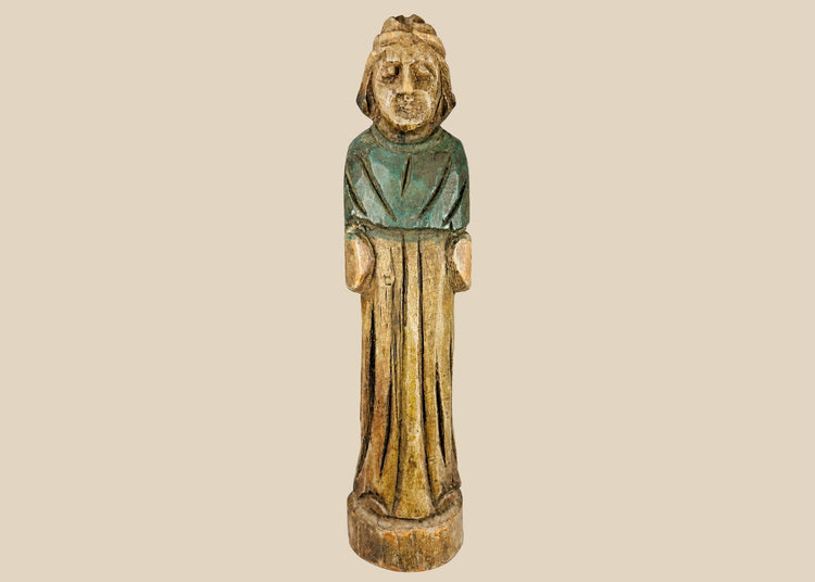 Antique European folk art figurine, 18th–19th century, hand-carved wood with painted surface, depicting a robed figure.