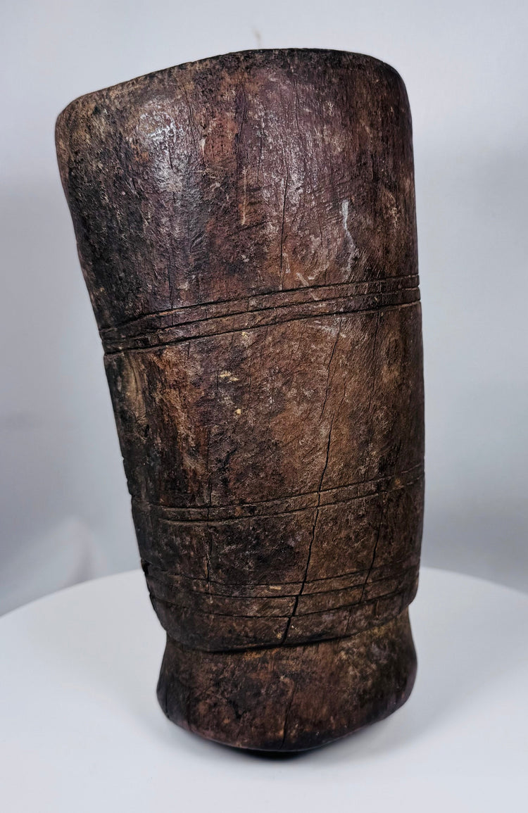Antique Nepalese carved wooden domestic container with deep hollowed interior and primitive form
