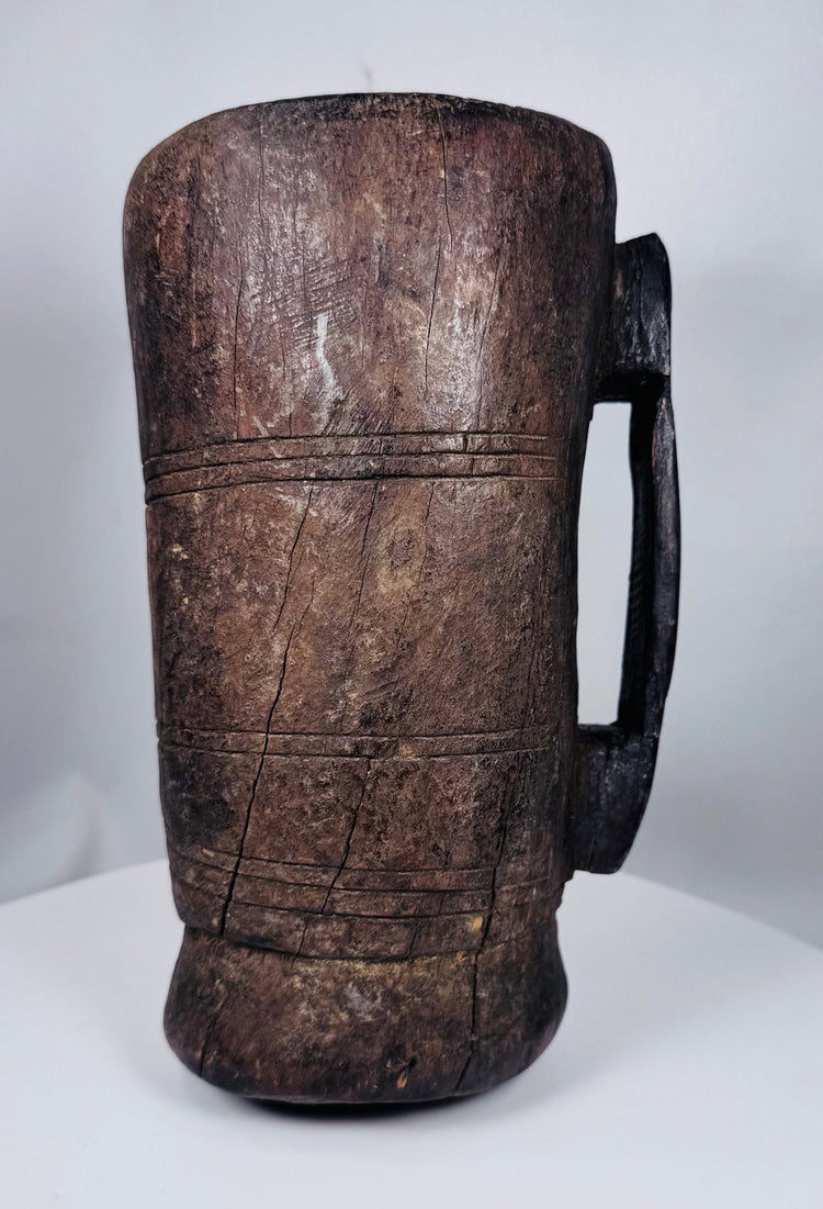 Primitive carved Himalayan storage container associated with traditional rural household use