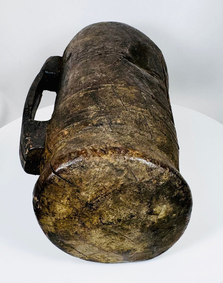Hand-carved Himalayan ethnographic artifact with deep cylindrical body and attached carved handle
