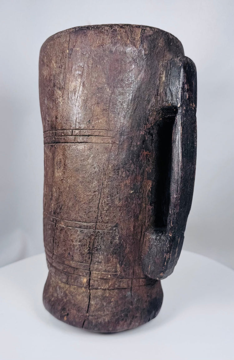 Himalayan ethnographic wooden storage vessel with incised linear decoration and dark patina