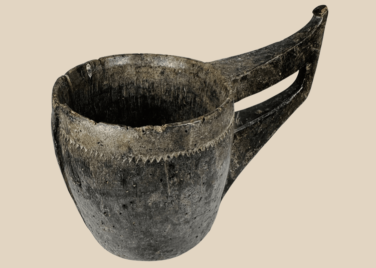 Antique Himalayan hand-carved wooden ceremonial vessel with elongated sculptural handle