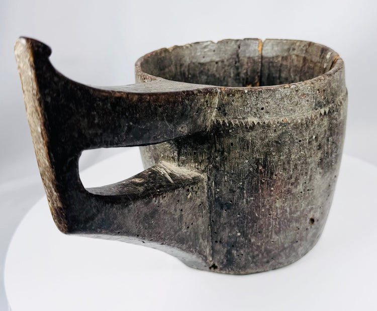 Antique Himalayan ethnographic artifact with weathered patina, insect wear, and carved decoration
