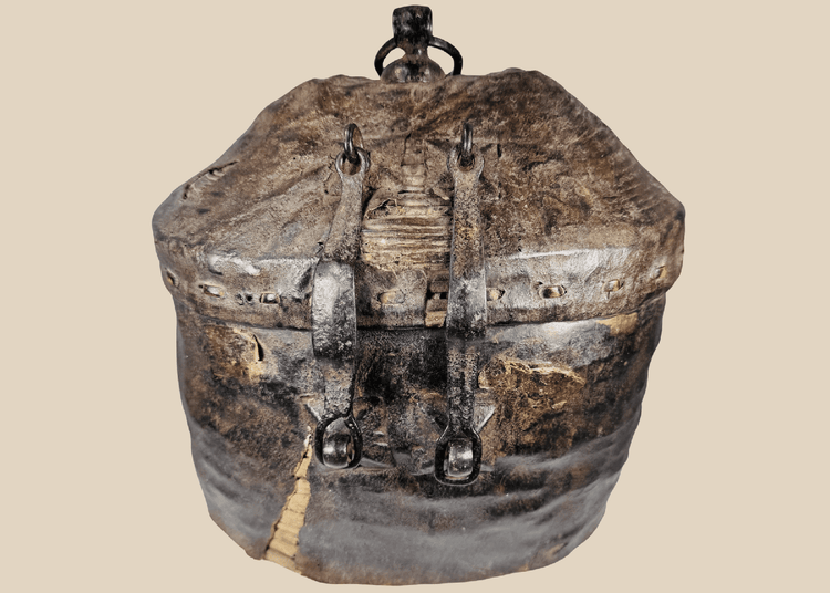 Antique Himalayan woven storage container with leather covering and forged iron hardware
