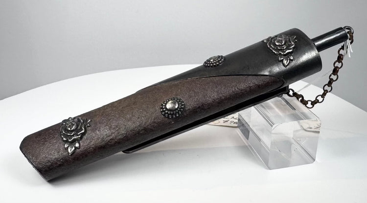 Antique Japanese Meiji period gunpowder flask with textured leather body and silver rose metalwork