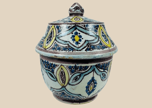 Antique Moroccan hand-painted pottery jar with fitted lid and floral decoration