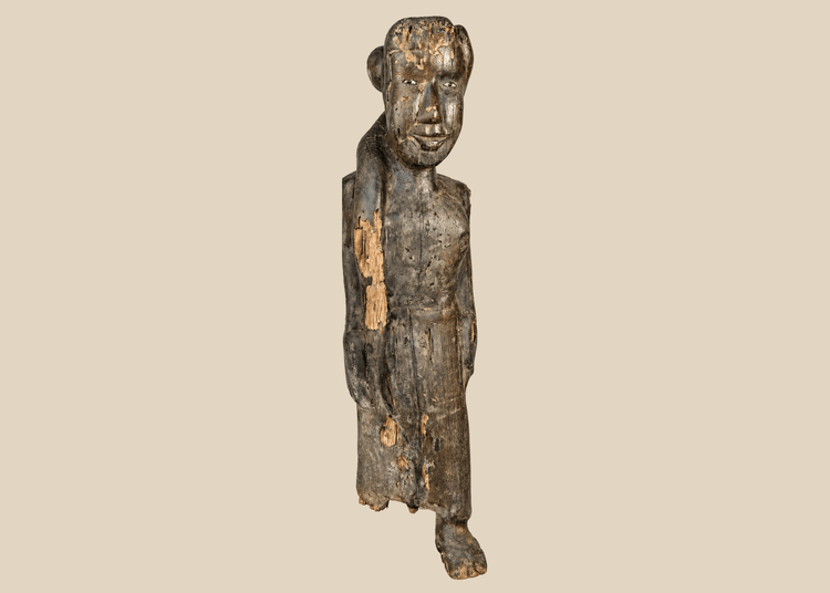 Antique Dayak ancestral wooden figure from Borneo with encrusted patina