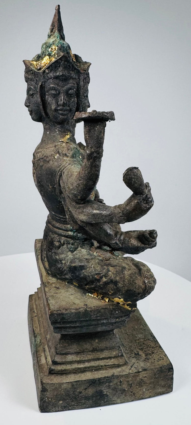 Back view of the Rattanakosin bronze Phra Phrom sculpture and stepped base
