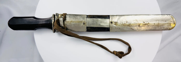 Tibetan single-edged dagger housed in its original silver-mounted scabbard
