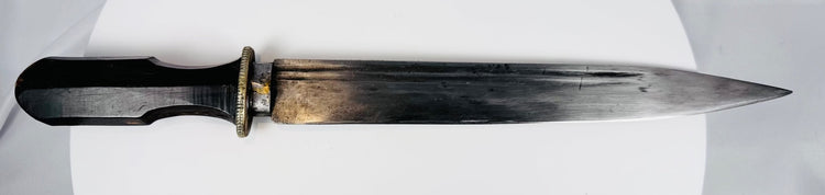 Forged steel Tibetan dagger with faceted horn grip and silvered guard