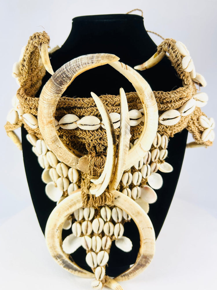 Papua New Guinea apron with boar tusks and cowries, used in tribal ceremonies and dances