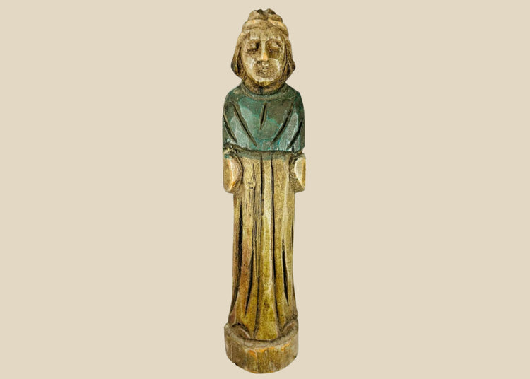 Antique European folk art figurine, 18th–19th century, hand-carved wood with painted surface, depicting a robed figure.